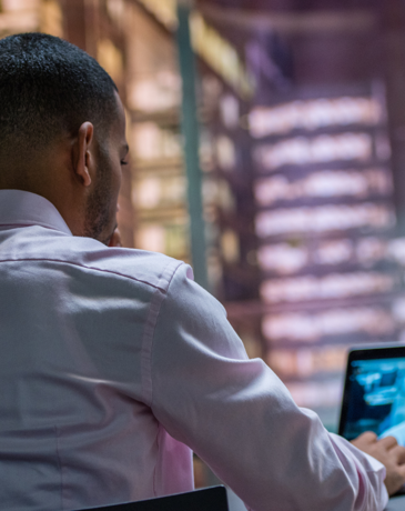 A man on a laptop accessing digital resources